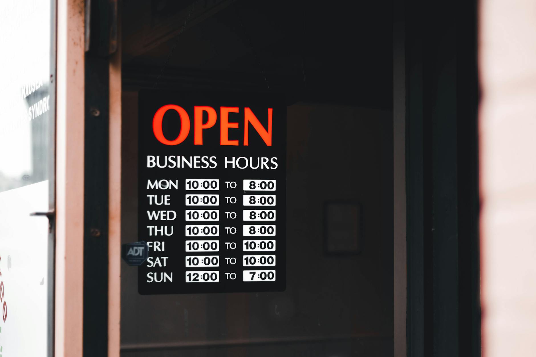 photo of business hours signage
